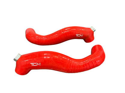 Two red silicone hose pipes with 'TCN' branding on a white background